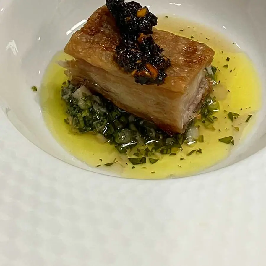 Crispy pork belly with salsa verde and chili crunch — Stanford-trained chef Coach Cal