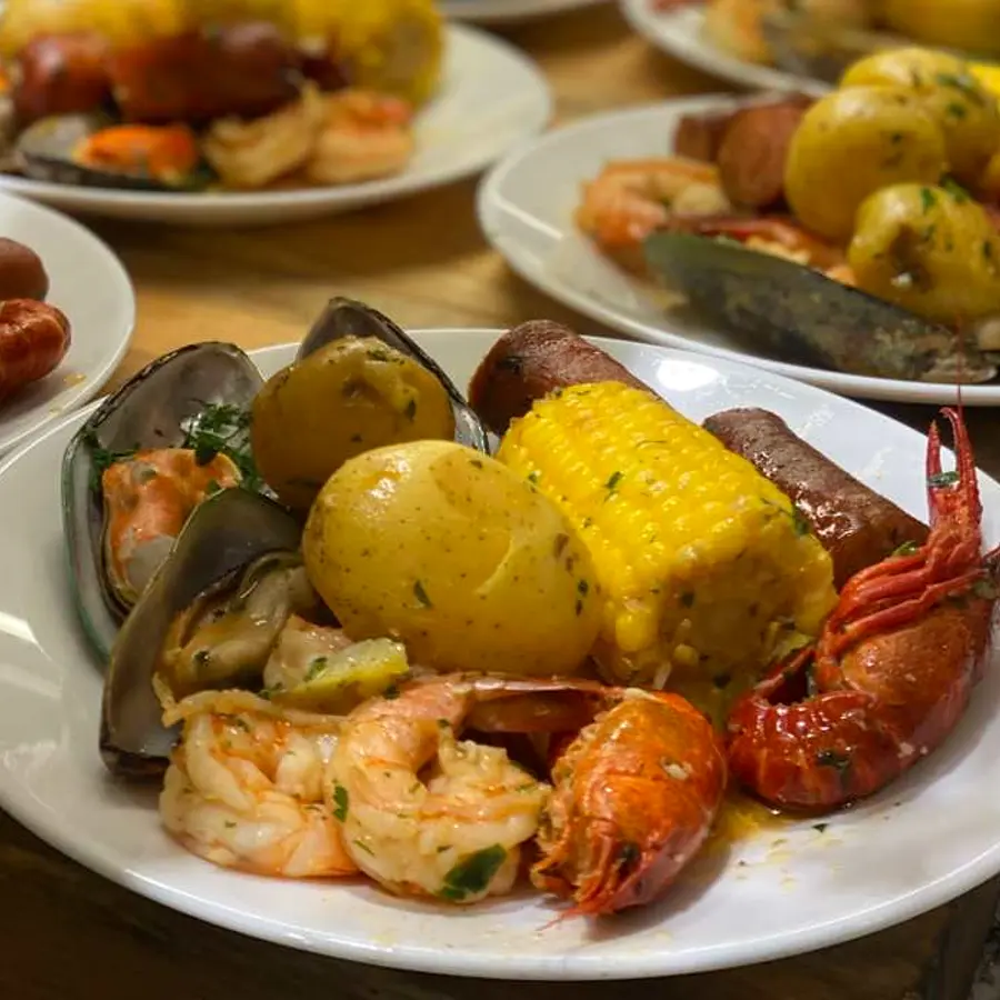 Bay-style seafood boil — shrimp, crawfish, mussels, corn and andouille catering by Coach Cal